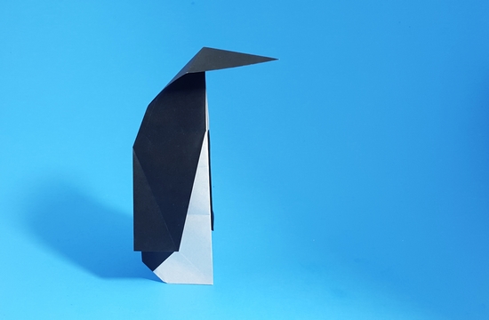 Origami Penguin by Ioana Stoian. Folded from a square or origami paper by Gilad Aharoni on giladorigami.com