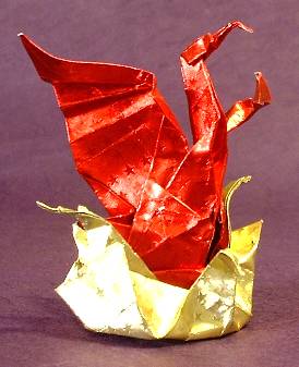 Origami Phoenix by Max Hulme. Folded from 2 squares of patterned foil by Gilad Aharoni on giladorigami.com