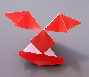 Origami Pierrot face by Kunihiko Kasahara. Folded from a square of origami paper by Gilad Aharoni on giladorigami.com