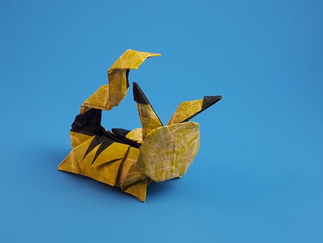 Origami Pikachu by Kozasa Keiichi. Wet-folded from a square of Vu paper by Gilad Aharoni on giladorigami.com