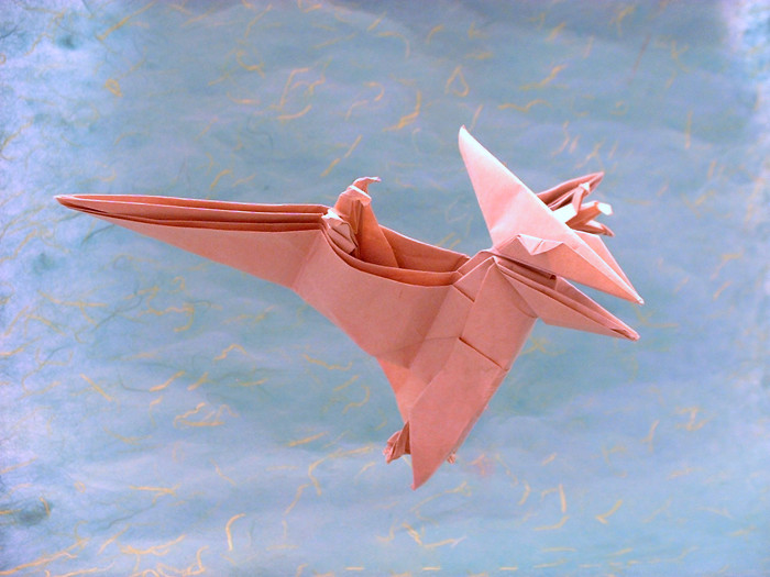 Origami Pteranodon by Fumiaki Kawahata. Folded from a square of thin brown wrapping paper by Gilad Aharoni on giladorigami.com