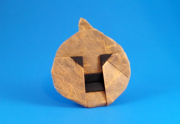 Origami Jack-o'-lantern by Marcia Joy Miller. Folded form a square of double sided unryu paper by Gilad Aharoni on giladorigami.com