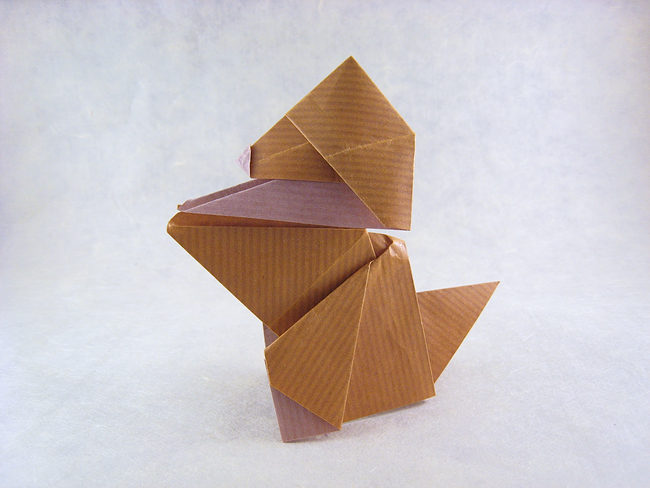 Origami Puppy by Roman Diaz. Folded from a square of Kraft origami paper by Gilad Aharoni on giladorigami.com