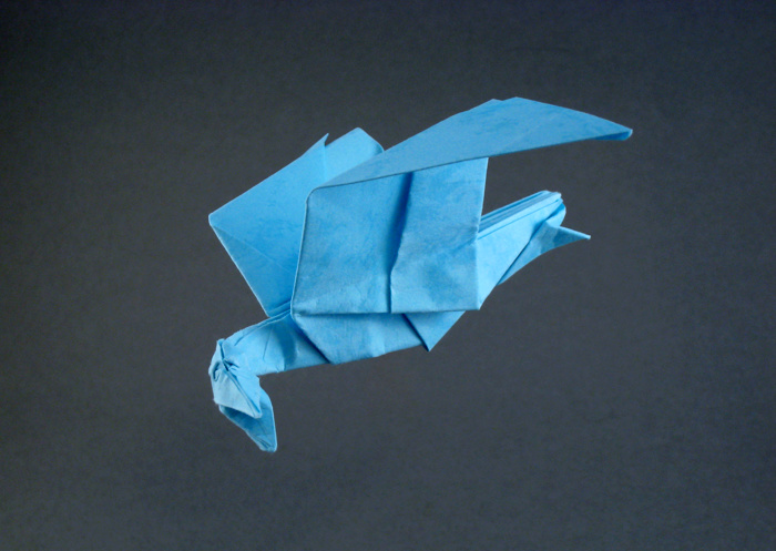Origami Quetzalcoatlus by John Montroll. Folded from a square of textured origami paper by Gilad Aharoni on giladorigami.com