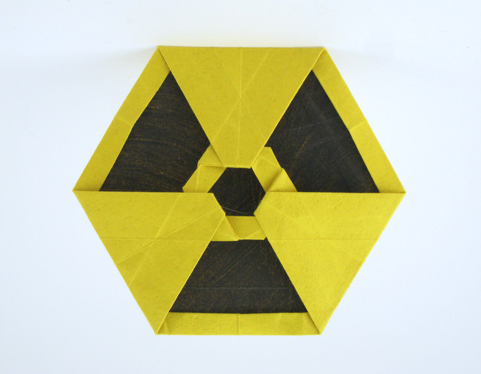 Origami Radioactive symbol by Morisue Kei. Folded from a triangle of Tant paper by Gilad Aharoni on giladorigami.com