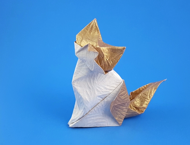 Origami Ragdoll by Roman Diaz. Folded from a square of Embossed Leaves paper by Gilad Aharoni on giladorigami.com