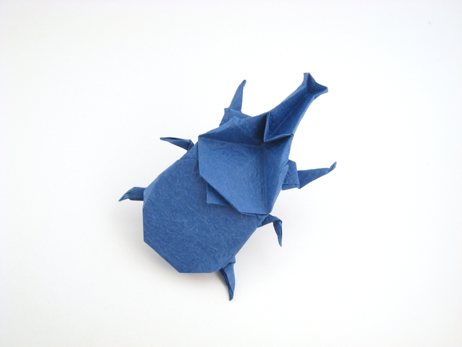 Origami Rhinoceros beetle by Fuchimoto Muneji. Folded from a square of Vietnamese wrapping-paper by Gilad Aharoni on giladorigami.com