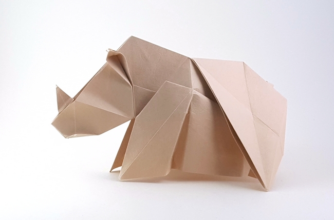 Origami Rhinoceros by Gen Hagiwara. Folded from a square of Kinumomi paper by Gilad Aharoni on giladorigami.com