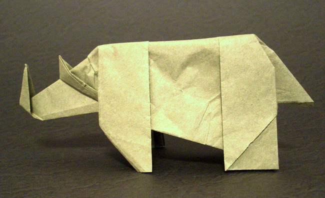 Origami Rhinoceros by Jason Ku. Folded from a square of Trimaco masking paper by Gilad Aharoni on giladorigami.com