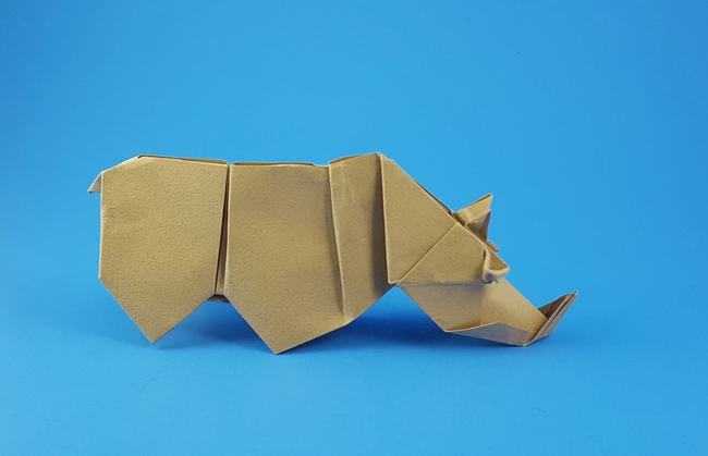 Origami Rhinoceros by Michael G. LaFosse. Folded from a square of Tant paper by Gilad Aharoni on giladorigami.com
