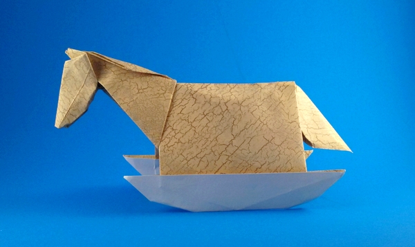 Origami Rocking horse by John Montroll. Folded from a square of scrapbooking paper by Gilad Aharoni on giladorigami.com