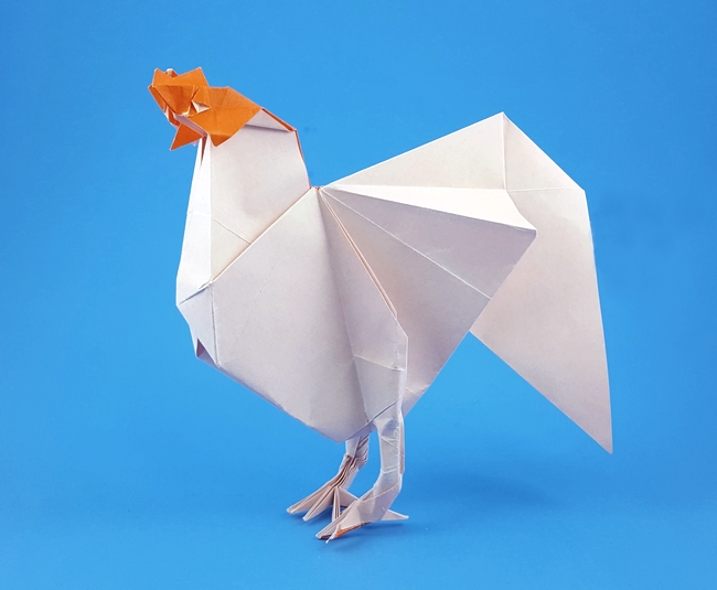 Origami Rooster by Yoo Tae Yong. Folded from a square of origami paper by Gilad Aharoni on giladorigami.com