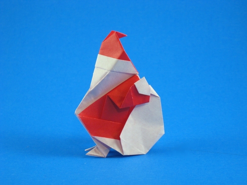 Origami Santa Claus by Ryo Aoki. Folded from a square of origami paper by Gilad Aharoni on giladorigami.com