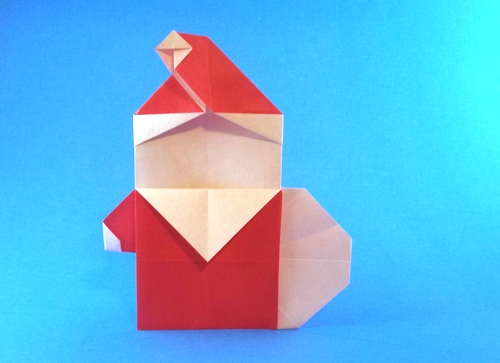 Origami Santa Claus with sack by Ryo Aoki. Folded from a square of origami paper by Gilad Aharoni on giladorigami.com