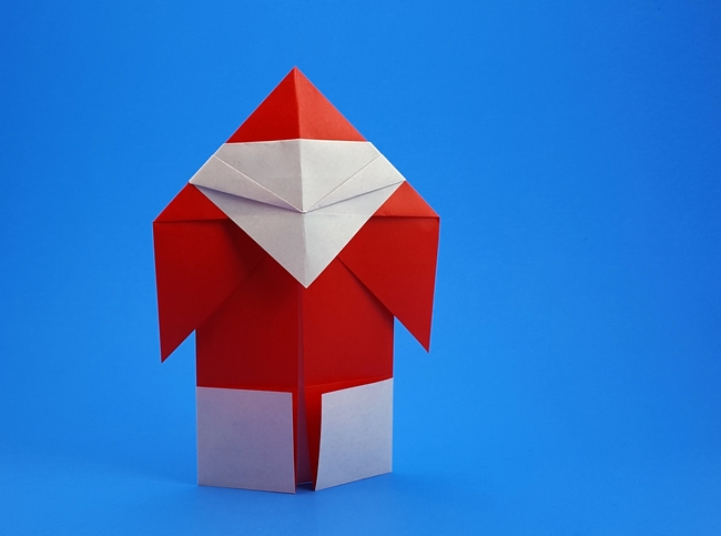 Origami Santa Claus by Asahi Isamu. Folded from 2 squares of origami paper by Gilad Aharoni on giladorigami.com