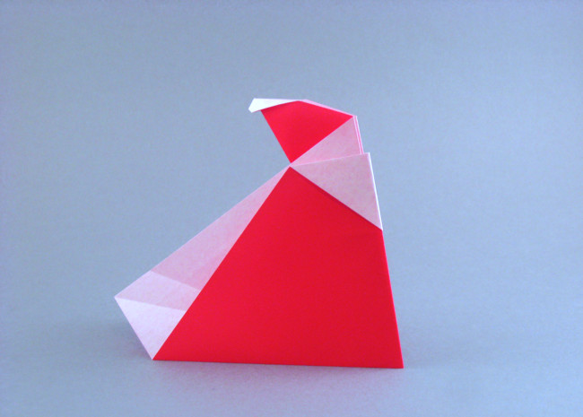 Origami Santa Claus by Sy Chen. Folded from a square of origami paper by Gilad Aharoni on giladorigami.com