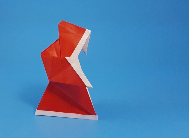 Origami Santa Claus by Edwin Corrie. Folded from a square of origami paper by Gilad Aharoni on giladorigami.com