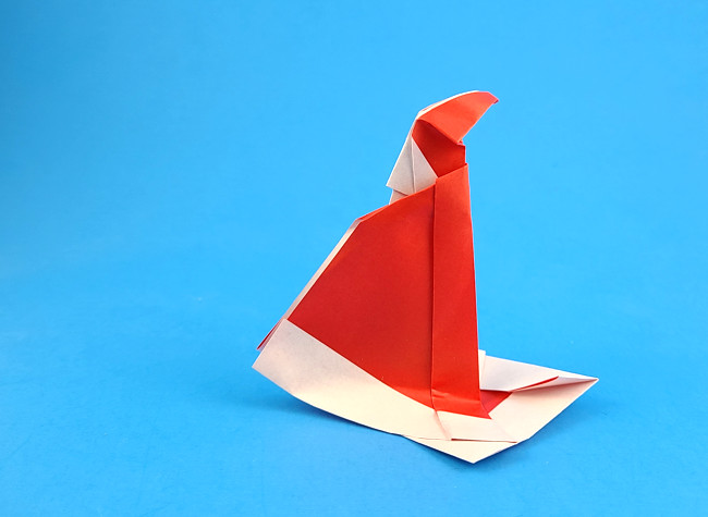 Origami Santa Claus by Dimitris Dalas. Folded from a square of origami paper by Gilad Aharoni on giladorigami.com