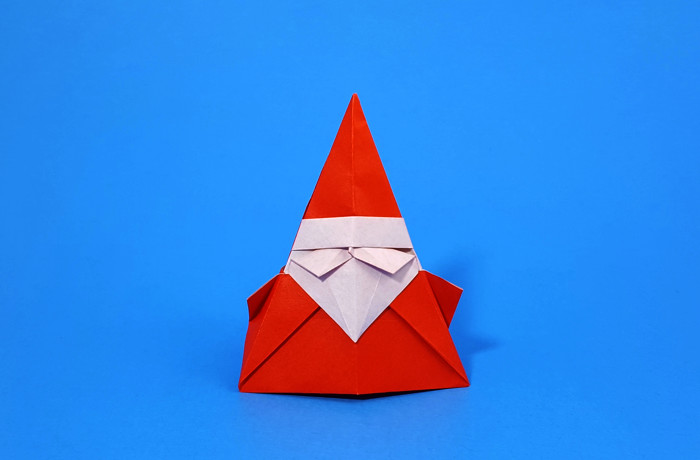 Origami Pyramid Santa Claus by Roman Diaz. Folded from a square of origami paper by Gilad Aharoni on giladorigami.com
