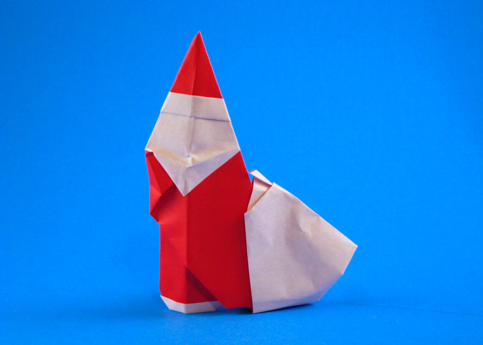 Origami Santa Claus by Giang Dinh. Folded from a square of origami paper by Gilad Aharoni on giladorigami.com