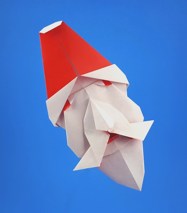 Origami Santa Claus by Taichiro Hasegawa. Folded from 3 squares of origami paper by Gilad Aharoni on giladorigami.com