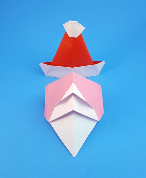 Origami Santa Claus hat by Akira Yoshizawa. Folded by Gilad Aharoni on giladorigami.com
