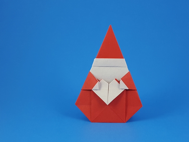 Origami Santa with heart by Fuchimoto Muneji. Folded from a square of origami paper by Gilad Aharoni on giladorigami.com