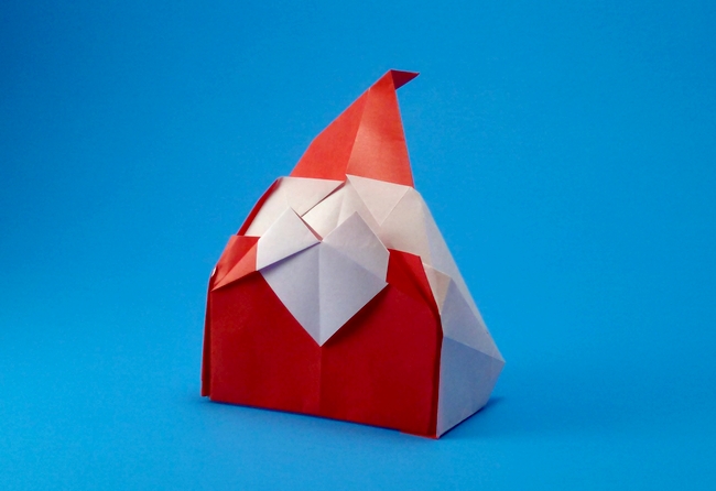 Origami Santa Claus by Horiguchi Naoto. Folded from a square of origami paper by Gilad Aharoni on giladorigami.com