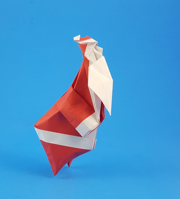 Origami Santa Claus by Kamei Kohe. Folded from a square of origami paper by Gilad Aharoni on giladorigami.com