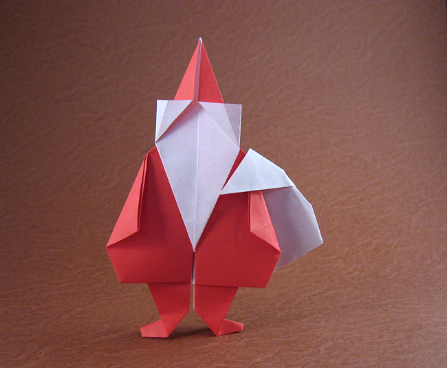 Origami Santa Claus by Jun Maekawa. Folded from a square of origami paper by Gilad Aharoni on giladorigami.com