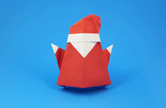 Origami Santa Claus by Marc Kirschenbaum. Folded from a square of origami paper by Gilad Aharoni on giladorigami.com