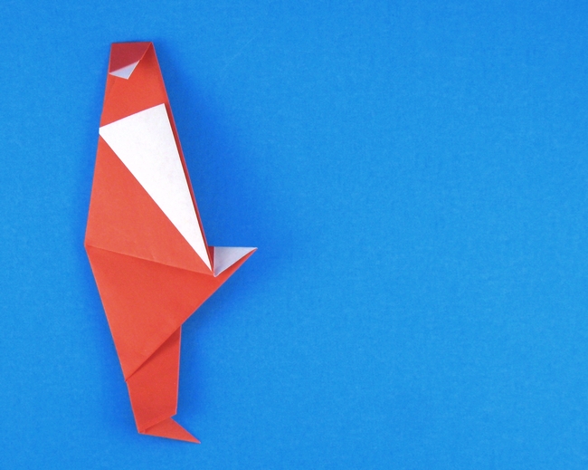 Origami Santa Claus and chimney by Francesco Miglionico. Folded by Gilad Aharoni on giladorigami.com