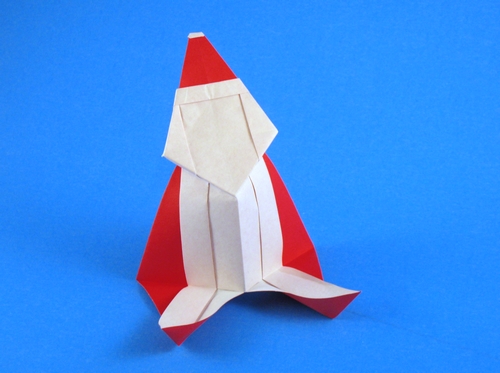 Origami Santa Claus - Jolly Santa by Marcia Joy Miller. Folded from a square of origami paper by Gilad Aharoni on giladorigami.com