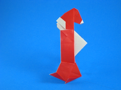 Origami Santa Claus by Katsushi Nosho. Folded from a square of origami paper by Gilad Aharoni on giladorigami.com