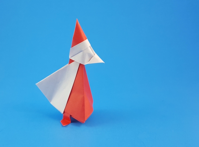 Origami Santa Claus by Katsushi Nosho. Folded from 2 squares of origami paper by Gilad Aharoni on giladorigami.com