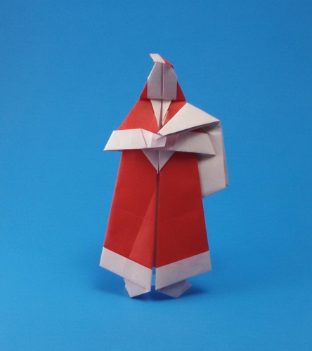 Origami Santa and his sack by John Smith. Folded from 2 squares of origami paper by Gilad Aharoni on giladorigami.com