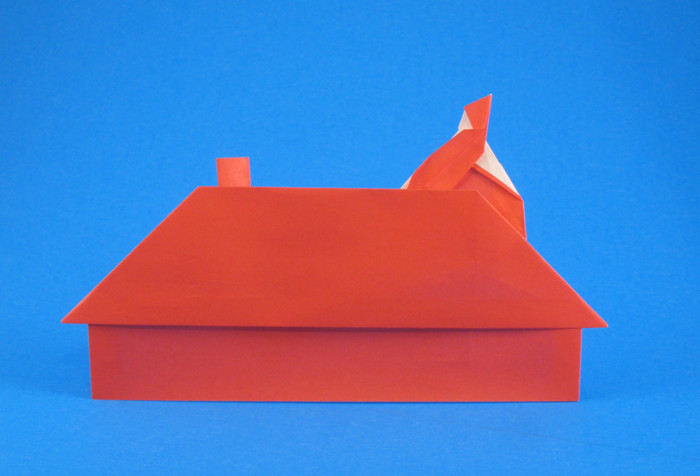 Origami Santa Claus on the roof by Iris Walker. Folded by Gilad Aharoni on giladorigami.com