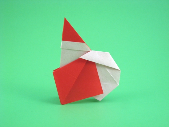 Origami Santa Claus by Yamada Katsuhisa. Folded from a square of origami paper by Gilad Aharoni on giladorigami.com