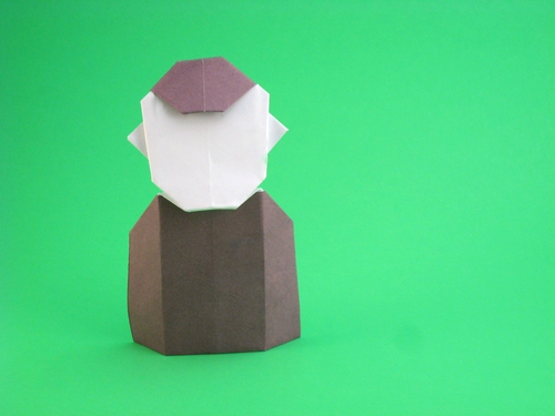 Origami Schoolboy by David Petty. Folded from a rectangle of scrapbooking paper by Gilad Aharoni on giladorigami.com