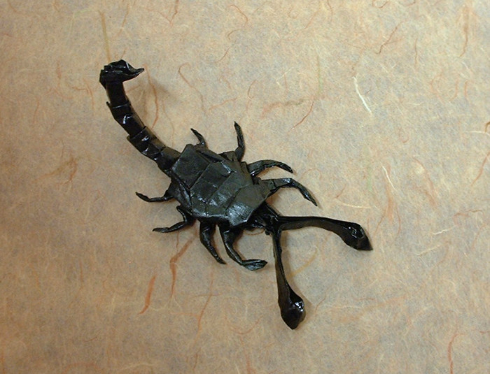 Origami Scorpion by Alfredo Giunta. Folded from a rectangle of painted thin brown wrapping paper by Gilad Aharoni on giladorigami.com
