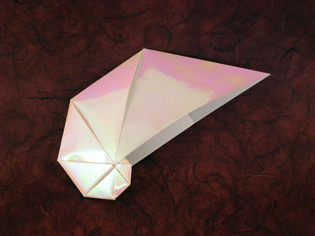 Origami Spiral shell by Jun Maekawa. Folded from a square of holographic paper by Gilad Aharoni on giladorigami.com