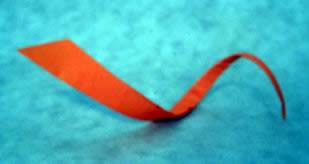 Origami Shofar by Joel Stern. Folded from a square of origami paper by Gilad Aharoni on giladorigami.com