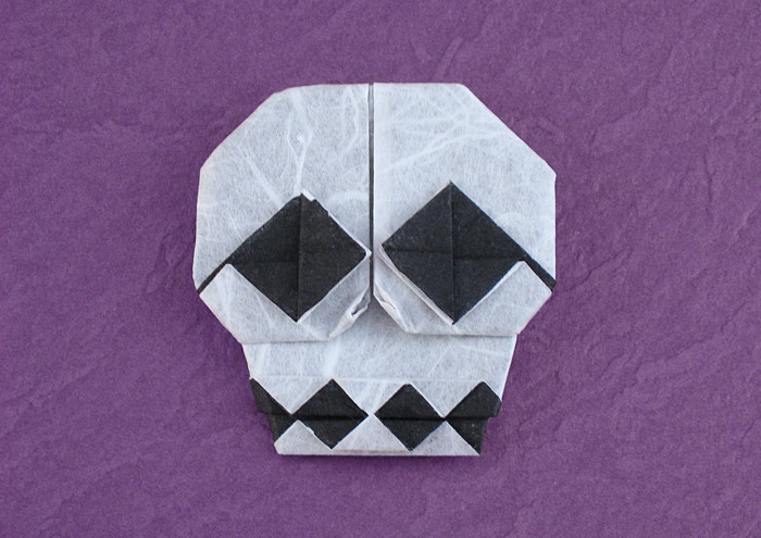 Origami Skull by Ryo Aoki. Folded from a square of double-sided Unryu paper by Gilad Aharoni on giladorigami.com