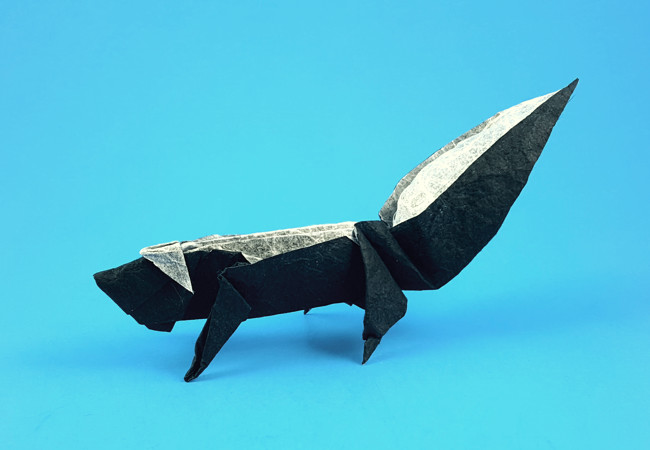 Origami Skunk by Max Hulme. Folded from a triangle of Duo Thai paper by Gilad Aharoni on giladorigami.com