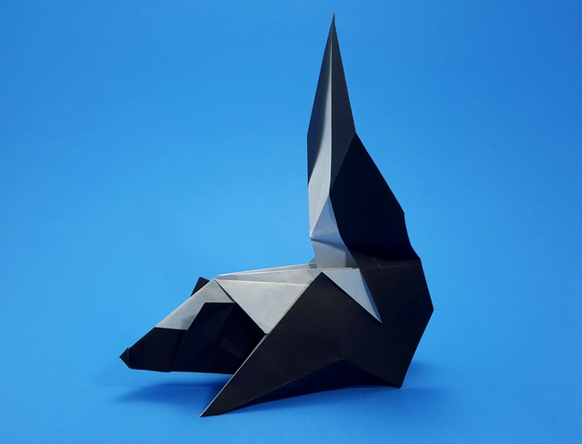 Origami Skunk by Michael G. LaFosse. Folded from a square of origami paper by Gilad Aharoni on giladorigami.com