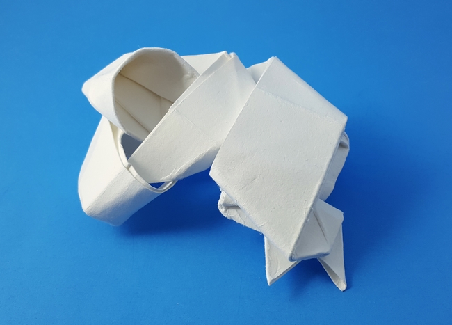Origami Sleeping child by Nguyen Tu Tuan. Wet folded from a square of watercolor paper by Gilad Aharoni on giladorigami.com