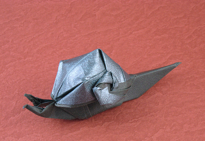 Origami Snail by Seo Won Seon (Redpaper). Folded from a square of textured origami paper by Gilad Aharoni on giladorigami.com