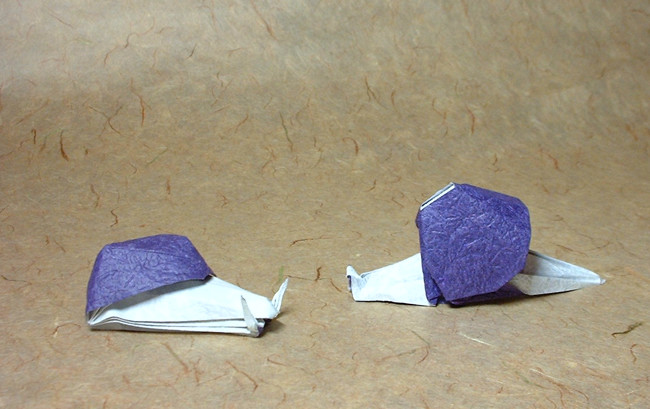 Origami Snail by Alfredo Giunta. Each folded from a square of momigami by Gilad Aharoni on giladorigami.com