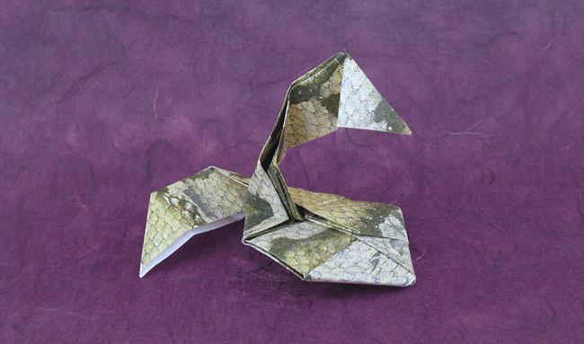 Origami Snake by Jun Maekawa. Folded from a square of animal-patterned origami paper by Gilad Aharoni on giladorigami.com