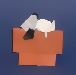 Origami Snoopy by Kunihiko Kasahara. Folded from 3 squares of origami paper by Gilad Aharoni on giladorigami.com